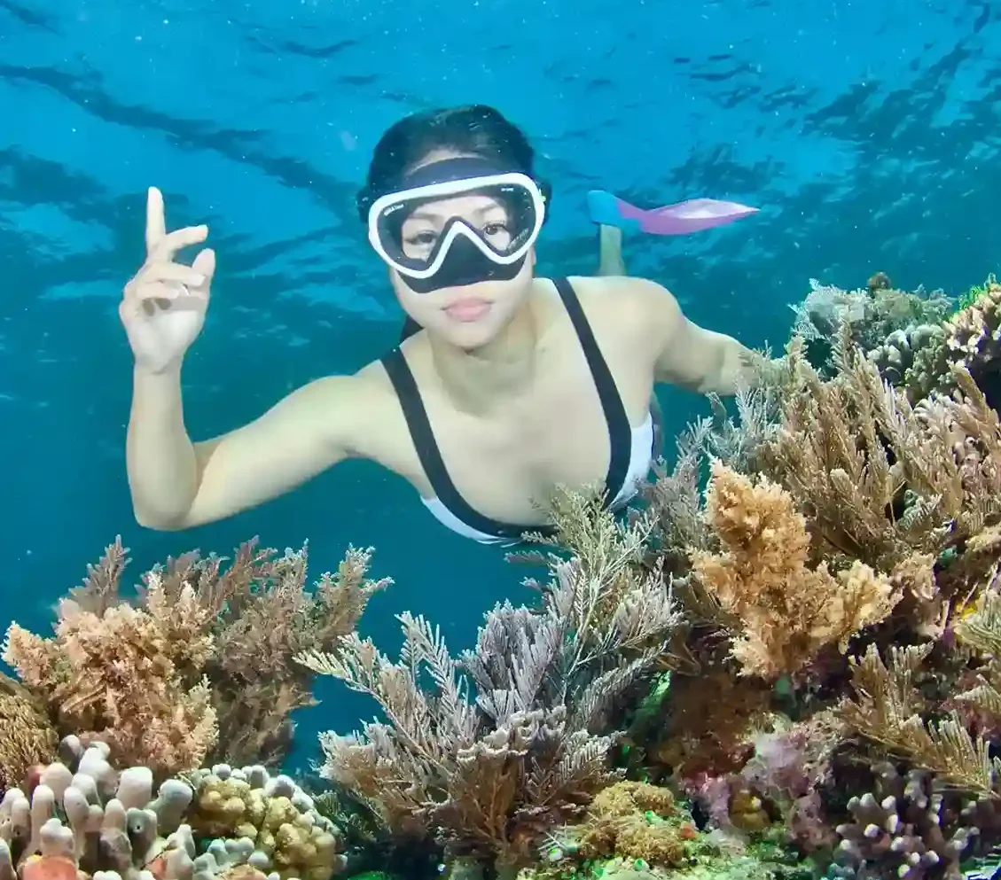 Snorkelling over the reef at Siaba, Komodo